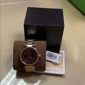 Michael Kors White and Yellow Gold Watch.